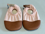 Chaussons les pas petits rose